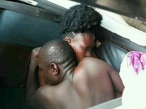 A married Kenyan man and his lover are pictured after his penis became caught inside her.