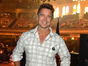 John Schneider attends the Johnny Cash Limited-Edition Forever Stamp launch at Ryman Auditorium in Nashville on June 5, 2013.