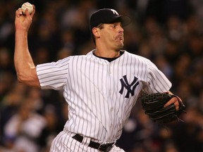 Former MLB pitcher Kevin Brown, seen here in action with the Yankees in 2004, used a gun to detain two men accused of stealing his mail.