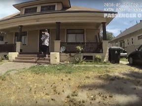 This May 6, 2018 image from video from a police body camera, provided by the Los Angeles Police Department shows officers interacting with Jose Chavez, before he died in custody.