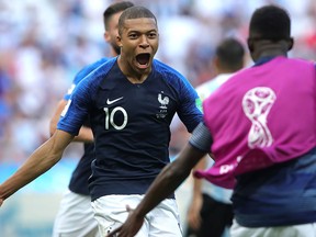 Kylian Mbappe of France celebrates after scoring his team's fourth goal during the 2018 FIFA World Cup Russia Round of 16 match between France and Argentina at Kazan Arena on June 30, 2018 in Kazan, Russia.