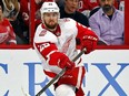 In this Feb. 2, 2018, file photo, Detroit Red Wings' Mike Green clears the puck against the Carolina Hurricanes during the first period of an NHL hockey game in Raleigh, N.C.