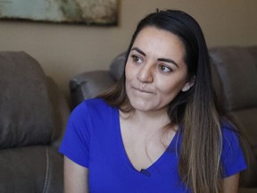Nicole Arteaga tells her story about how a Walgreens pharmacist allegedly denied her prescription because it was against his ethics, during an interview from inside her home in Peoria, Ariz., Saturday, June 23, 2018.