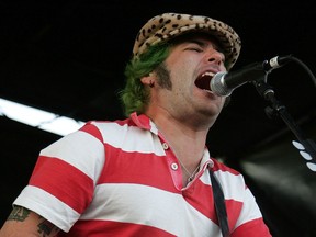 Musician "Fat" Mike Burkett of NOFX performs live on stage at the Vans Warped Tour on Aug. 5, 2006 in Uniondale, N.Y.