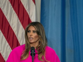 FILE - In this Sept. 20, 2017, file photo, first lady Melania Trump addresses a luncheon at the U.S. Mission to the United Nations in New York. Trump "hates" to see families separated at the border and hopes "both sides of the aisle" can reform the nation's immigration laws, according to a statement Sunday, June 17, 2018, about the controversy over separation of immigrant parents and children at the U.S.-Mexico border.
