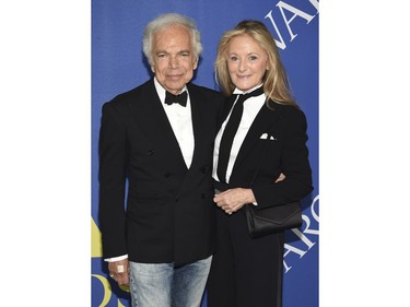 Designer Ralph Lauren, left, and Ricky Anne Loew-Beer arrive at the CFDA Fashion Awards at the Brooklyn Museum on Monday, June 4, 2018, in New York.