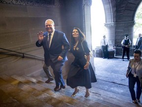 Premier-designate Doug Ford and his wife Karla arrive at Queen's Park as he prepares to be sworn in as Ontario's new Premier in Toronto on Friday, June 29, 2018. THE CANADIAN PRESS/Chris Young