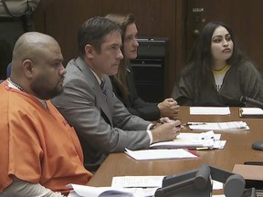 In this video frame grab Isauro Aguirre, left and Pearl Sinthia Fernandez, right, sit during their sentencing hearing on Thursday, June 7, 2018, in Palmdale, Calif.