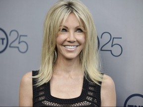 Heather Locklear arrives at the TNT 25th Anniversary Party at The Beverly Hilton Hotel in Los Angeles on July 24, 2013. (Richard Shotwell/Invision/AP)