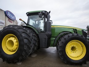 A John Deere tractor is seen parked outside of Rexall Place in Edmonton, Alta., on Tuesday, Nov. 4, 2014 ahead of the start of the Canadian Finals Rodeo. CFR 2014 runs from Nov. 5 - 9. (Ian Kucerak/Edmonton Sun/QMI Agency)
