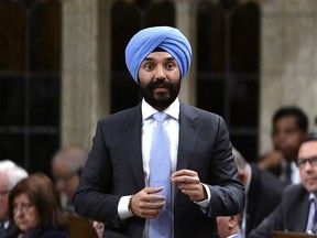 Minister of Innovation, Science and Economic Development Navdeep Bains rises during Question Period in the House of Commons on Parliament Hill in Ottawa on Monday, June 18, 2018. (The Canadian Press/Justin Tang)