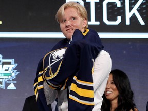 Rasmus Dahlin celebrates after being selected first overall by the Buffalo Sabres during the first round of the 2018 NHL Draft at American Airlines Center on June 22, 2018 in Dallas, Texas.