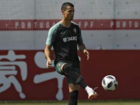 Portugal's Cristiano Ronaldo plays the ball with teammates during the training session of Portugal at the 2018 soccer World Cup in Kratovo, outskirts Moscow, Russia, Saturday, June 23, 2018.