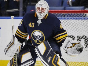 In this Dec. 12, 2017, file photo, Sabres goalie Robin Lehner makes a glove save during warm-ups prior to a game against the Senators, in Buffalo, N.Y.