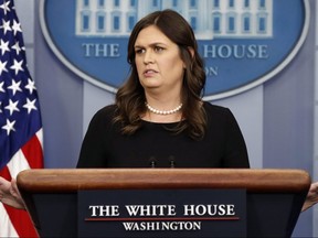 White House press secretary Sarah Huckabee Sanders says she was asked to leave a Virginia restaurant Friday night.