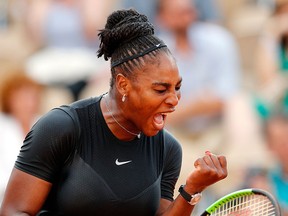 Serena Williams of the U.S. celebrates winning a point as she plays Germany's Julia Georges during their third round match of the French Open tennis tournament at the Roland Garros stadium, Saturday, June 2, 2018 in Paris.