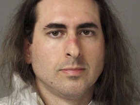 In this June 28 2018 photo released by the Anne Arundel Police, Jarrod Warren Ramos poses for a photo, in Annapolis, Md.