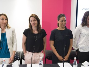 Victims of Bertrand Charest, from left, Amelie-Frederique Gagnon, Gail Kelly, Anna Prchal and Genevieve Simard attend a news conference in Montreal, Monday, June 4, 2018. (The Canadian Press/Graham Hughes)