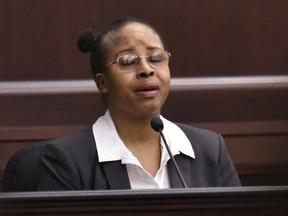 Gloria Williams testifies on the second day of her sentencing hearing Friday, May 4, 2018, at the Duval County Courthouse in Jacksonville, Fla. Williams pleaded guilty in the kidnapping of infant Kamiyah Mobley from University Medical Center in 1998 when Kamiyah was an infant, and raised her as her own daughter, renaming her Alexis Manigo. (Will Dickey/The Florida Times-Union via AP)