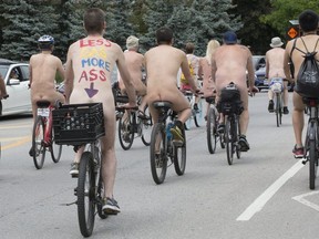 Riders took advantage of the warm weather as they ride in Toronto's 14th World Naked Bike Ride , on Saturday June 9, 2018. Stan Behal/Toronto Sun/Postmedia Network on Saturday June 9, 2018.