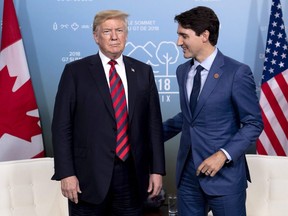 Canada's Prime Minister Justin Trudeau meets with U.S. President Donald Trump at the G7 leaders summit in La Malbaie, Que., on June 8, 2018.