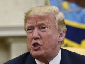 President Donald Trump meets with Japanese Prime Minister Shinzo Abe in the Oval Office of the White House in Washington, Thursday, June 7, 2018. summit. (AP Photo/Susan Walsh)