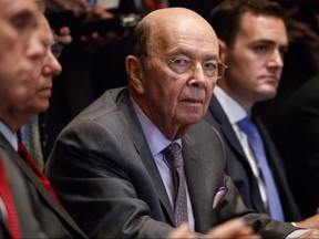 U.S. Secretary of Commerce Wilbur Ross listens during a meeting between President Donald Trump and Republican members of Congress on immigration in the Cabinet Room of the White House, Wednesday, June 20, 2018, in Washington.