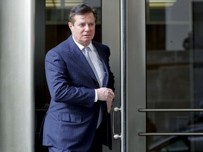 In this Feb. 14, 2018, file photo, Paul Manafort, U.S. President Donald Trump's former campaign chairman, leaves the federal courthouse in Washington.