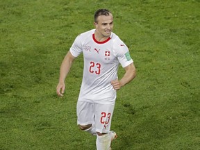 Switzerland's Xherdan Shaqiri celebrates during Group E action against Serbia at the 2018 World Cup at the Kaliningrad Stadium in Kaliningrad, Russia, Friday, June 22, 2018.