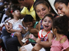 In this May 3, 2018 photo, mothers with their children, who were born with the Zika-caused microcephaly birth defect, sit in a waiting room at the Getulio Vargas Hospital, in Recife, Brazil. (AP)