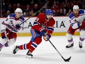 Montreal Canadiens center Phillip Danault blows past New York Rangers defenseman Brady Skjei during NHL action in Montreal Thursday February 22, 2018. New York Rangers center Kevin Hayes, right, looks on. (Allen McInnis / MONTREAL GAZETTE)