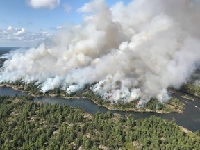 An aerial view taken over the Parry Sound 33 fire is shown in this handout image. The blaze, known as Parry Sound 33, sprung up on July 18. Ontario firefighters have been fighting it with the help of their counterparts from other provinces, as well as the United States and Mexico.
