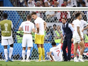 England manager Gareth Southgate and his players stand in front of the crowd after Wednesday's loss to Croatia. (GETTY IMAGES)
