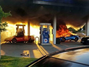 A blue Lamborghini is ablaze after a mishap at a Missouri gas station. (Facebook)