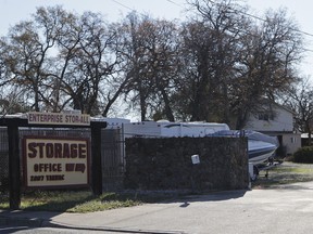 This Dec. 15, 2015, file photo, shows the entrance to a commercial storage unit facility is shown where two children were found dead in Redding, Calif.  (Andreas Fuhrmann/The Record Searchlight via AP)