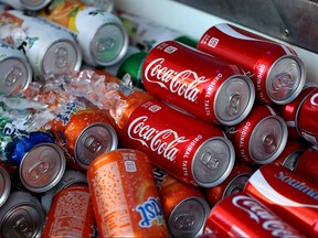 Cans of soda are displayed in a cooler on June 29, 2018 in San Francisco, California. (Justin Sullivan/Getty Images)