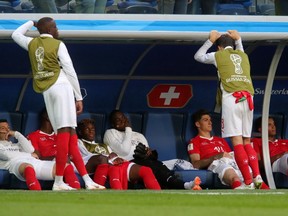 Switzerland players look dejected following their sides defeat in the 2018 FIFA World Cup Russia Round of 16 match between Sweden and Switzerland at Saint Petersburg Stadium on July 3, 2018 in Saint Petersburg, Russia. (Alexander Hassenstein/Getty Images)