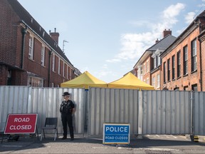 Police stand guard on a cordon outside the John Baker House Sanctuary Supported Living in Salisbury on July 9, 2018 in Wiltshire, England. (Matt Cardy/Getty Images)