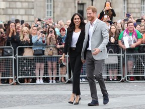 Prince Harry, Duke of Sussex and Meghan, Duchess of Sussex visit Trinity College on the second day of their official two day royal visit to Ireland on July 11, 2018 in Dublin, Ireland. (Gareth Fuller-Pool/Getty Images)