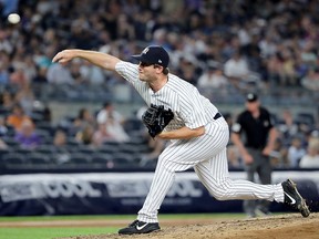 Adam Warren of the New York Yankees delivers a pitch against the Kansas City Royals at Yankee Stadium on July 26, 2018 in New York. (Elsa/Getty Images)