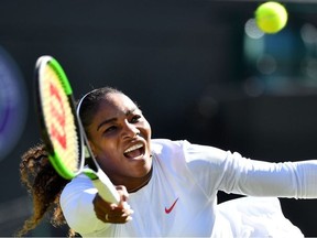 US player Serena Williams returns against Netherlands' Arantxa Rus during their women's singles first round match on the first day of the 2018 Wimbledon Championships at The All England Lawn Tennis Club in Wimbledon, southwest London, on July 2, 2018.