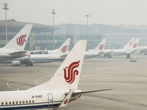 This file photo taken on April 6, 2017 shows Air China planes parked at the Beijing Capital International Airport.