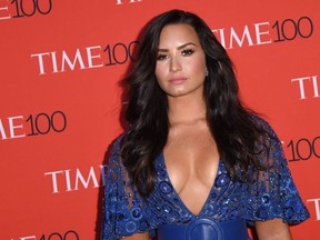 (FILES) In this file photo taken on April 25, 2017 Demi Lovato attends the 2017 Time 100 Gala at Jazz at Lincoln Center in New York City. Pop star Demi Lovato was rushed to a Los Angeles hospital on July 24, 2018 after an apparent heroin overdose, the celebrity news site TMZ said.