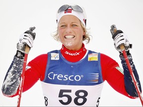 Norway's Vibeke Skofterud, second placed in the women's World Cup 10-kilometer free style cross-country ski race, reacts as she crosses the finish line in Beitostolen, Norway on Nov. 24, 2007. (Daniel Sannum Lauten/Getty Images)