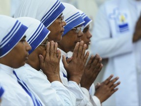 Indian nuns of the Catholic order of Missionaries of Charity attend a service to commemorate the 19th death anniversary of Mother Teresa at the Missionaries of Charity house in Kolkata on September 5, 2016. (Dibyangshu Sarkar/Getty Images)