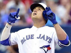 Blue Jays shortstop Aledmys Diaz reacts after hitting a home run during third inning MLB action against the Orioles, in Toronto on Friday, July 20, 2018.