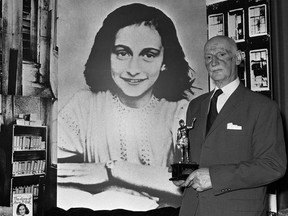 FILE - In this Monday, June 14, 1971 photo Dr. Otto Frank holds the Golden Pan award, given for the sale of one million copies of the famous paperback 'The Diary of Anne Frank' in London, Great Britain. New research suggests that the family of Anne Frank, the world-famous Jewish diarist who died in the Holocaust, attempted to immigrate to the United States and later also to Cuba, but their efforts were tragically thwarted by America's restrictive immigration policy, cumbersome bureaucracy and the outbreak of World War II. Only Otto Frank survived the holocaust.