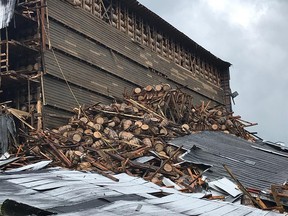 In this Friday June 22, 2018 file photo provided by the Bardstown, Ky., Fire Department, debris is piled in a heap after a section of a bourbon storage warehouse at the Barton 1792 Distillery collapsed, in Bardstown, Ky. (Chief Billy Mattingly/Bardstown Fire Department via AP, File)