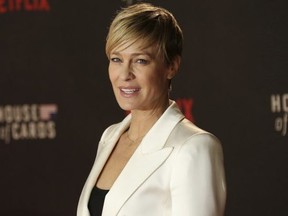 Actress Robin Wright poses for photographers upon arrival at the House Of Cards season 3 World Premiere at the Empire Cinema in central London on Feb. 26, 2015. (Joel Ryan/Invision/AP)