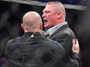 Brock Lesnar challenges Daniel Cormier after Cormier's heavyweight championship fight against Stipe Miocic at T-Mobile Arena on July 7, 2018 in Las Vegas. (Sam Wasson/Getty Images)